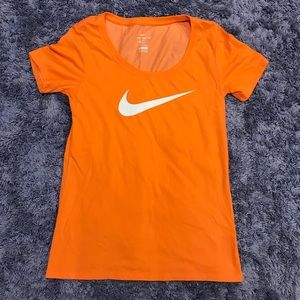 Orange Women’s Nike T-shirt  Dri-fit XS
